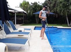 Pool Boy cleans the deck
