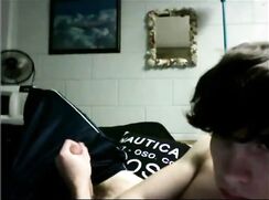 fit athletic guy wanking off on bed