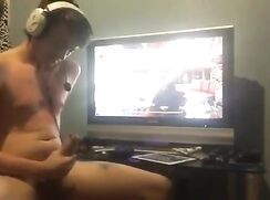 Gamer guy secretly wanking with friends on the call