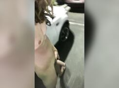 Nude in the parking lot w/cum
