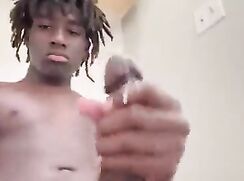 Black twink jerks off and cums