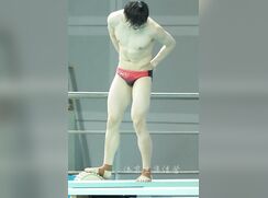 Beautiful trampoline diver prepares