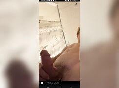 Bushy Twink pisses cums on himself