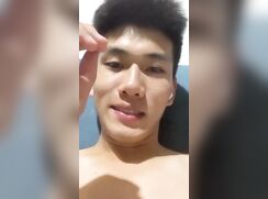 sporty asian busting a nutt