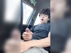 Cute curly haired twink in his car