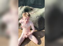 Jerking at the beach by the rocks