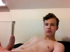 Uncut webcam boy strips, moves to bed and has a small cumshot