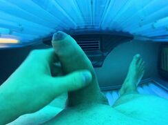 Cumshot in public solarium