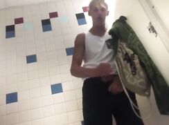 Blond boy in white tank top wanks (but nothing else)