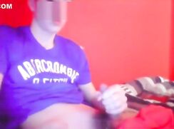 Webcam boy in Abercrombie shirt wanks and cums before red wall