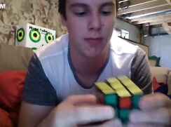 Cute webcam boy wanks cums then solves a rubik's cube