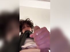 cute curly brunette cumming from bellow jo