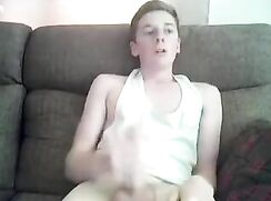 Poor quality webcam boy in white tank top