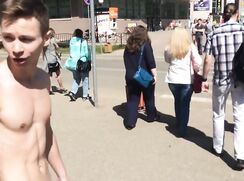 Naked Russian lad on a busy street