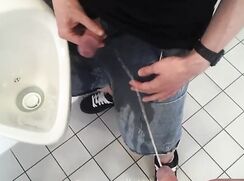 Pissing on my buddy then jerking off in the urinal