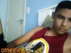 Shy latino boy at cam