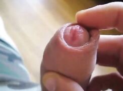 Play with the uncut cock until he comes