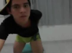 Teen boy makes strip show in his room