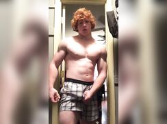 Muscle redhead cums