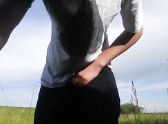 Twink masturbates outside in  field of dreams
