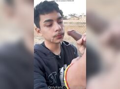 Nice boy sucks cock outside