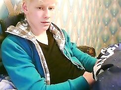 Blond cutie strokes his cock on webcam porn