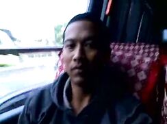 Indonesian boy on the bus