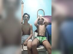Two Asian jerking
