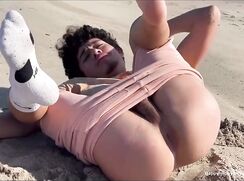 Latino shows perfect feet and hole at the beach in public