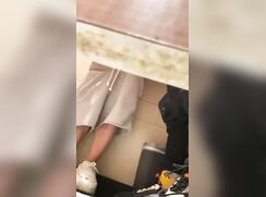 Two friends spied on while jacking in public toilet