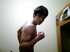 Muscle boys strips to his underwear poses and flexes (no nudity)