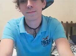 Tattoo Cut Dark Hair Blond in a Blue Cap Wanks off on webcam - AI Enhanced