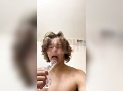 Yummy dude playing with his dildo