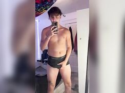 Husky twink stroking his cock selfie