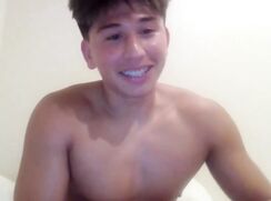 College Boy Trying Out Webcam Fun