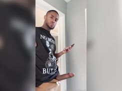 Fine black guy stroking his big dick