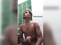 a dark skin latino shoots his leche into his chest and pees on you