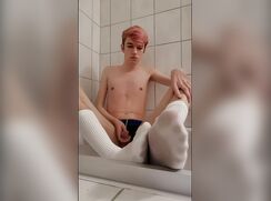 Sexy boy pisses white socks and cums