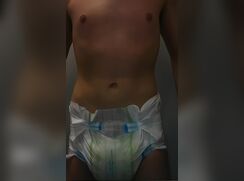 Twink overflows his diapers