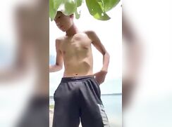 Cute Asia boy at the beach...