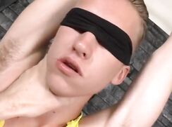 Leo blindfoldet and tied