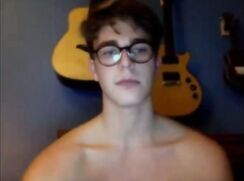 Glasses webcam boy with guitars on the wall wanks and cums