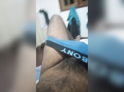 Sri Lankan Boy with blue undies selfie in annex room
