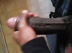 YOUNG DUDE STROKING HIS FAT DICK