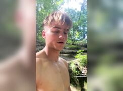 Joshua pissing in river