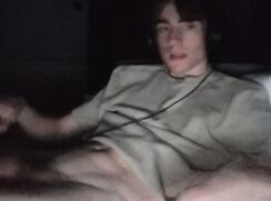 cute teen camboy covering his abs in cum