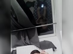 French seen stroking it through a window