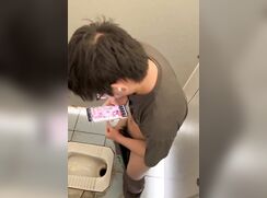 Spy on cute Asian boy cumming in the toilet