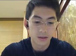 Muscular Asian with Glasses Busts a Nut