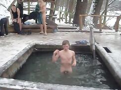 Winter bathing for naked Russians